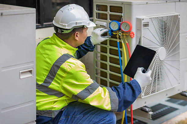 Professional Heat Pump Repair technician working in Republic, WA